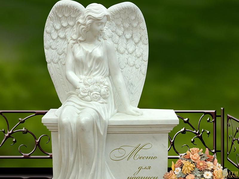 Lápida sepulcral del monumento de las alas del ángel