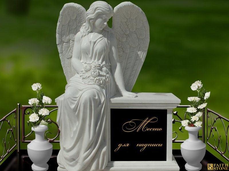 Lápida de alas de ángel